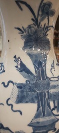 A pair of Chinese blue and white wall pocket vases with antiquities, Kangxi