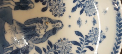 Nine Chinese blue and white 'Madonna and Child' saucers and two cups, Kangxi