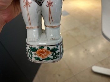 A pair of Chinese famille verte 'Hehe Er Xian' figures, Kangxi