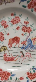A Chinese famille rose dish and two plates, Yongzheng/Qianlong