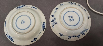 Three Chinese blue and white vases, a cup and two saucers, Kangxi and later