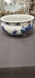 A Chinese blue and white tripod censer with figures in a mountainous landscape, Kangxi