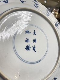 Three Chinese blue and white 'Mongolian hunt' dishes, Chenghua mark, Kangxi