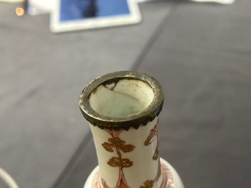 A Chinese iron-red and gilt-decorated triple gourd vase, Kangxi