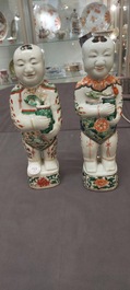 A pair of Chinese famille verte 'Hehe Er Xian' figures, Kangxi