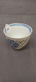 A rare Chinese reticulated double-walled blue and white 'phoenix' cup, Kangxi
