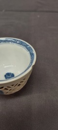 A rare Chinese reticulated double-walled blue and white 'phoenix' cup, Kangxi