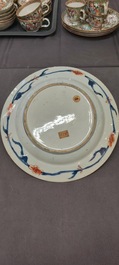 A Chinese famille rose dish and two plates, Yongzheng/Qianlong