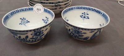 Nine Chinese blue and white 'Madonna and Child' saucers and two cups, Kangxi