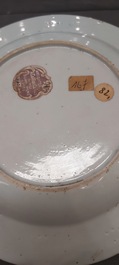 A Chinese famille rose dish and two plates, Yongzheng/Qianlong