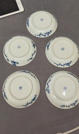 Nine Chinese blue and white 'Madonna and Child' saucers and two cups, Kangxi