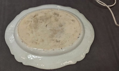 A Chinese dish with the portrait of Queen Victoria and the British crown, dated 1757, 18/19th C.