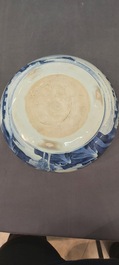 A Chinese blue and white tripod censer with figures in a mountainous landscape, Kangxi