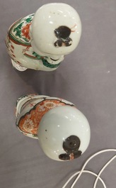 A pair of Chinese famille verte 'Hehe Er Xian' figures, Kangxi