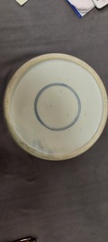 Een Chinese blauw-witte pot met decor van antiquiteiten, Kangxi