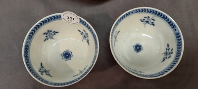 Nine Chinese blue and white 'Madonna and Child' saucers and two cups, Kangxi