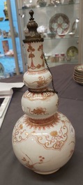 A Chinese iron-red and gilt-decorated triple gourd vase, Kangxi