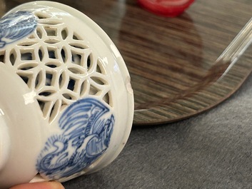 A rare Chinese reticulated double-walled blue and white 'phoenix' cup, Kangxi