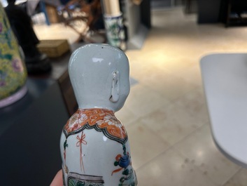 A pair of Chinese famille verte 'Hehe Er Xian' figures, Kangxi