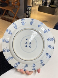 Three Chinese blue and white 'Mongolian hunt' dishes, Chenghua mark, Kangxi