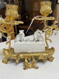 A Chinese Dehua blanc de Chine joss stick holder with French gilt bronze candlestick mounts, Kangxi and 18/19th C.
