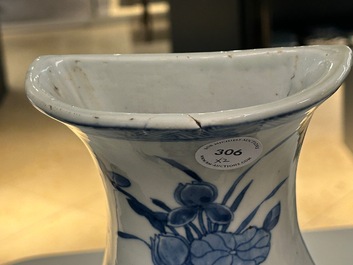 A pair of Chinese blue and white wall pocket vases with antiquities, Kangxi