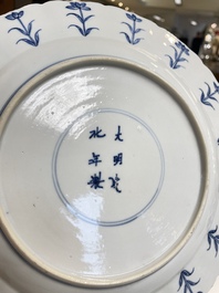 Three Chinese blue and white 'Mongolian hunt' dishes, Chenghua mark, Kangxi