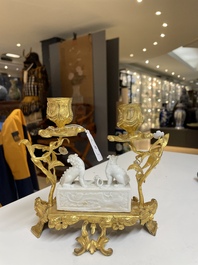 A Chinese Dehua blanc de Chine joss stick holder with French gilt bronze candlestick mounts, Kangxi and 18/19th C.