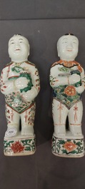 A pair of Chinese famille verte 'Hehe Er Xian' figures, Kangxi