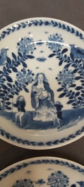 Nine Chinese blue and white 'Madonna and Child' saucers and two cups, Kangxi