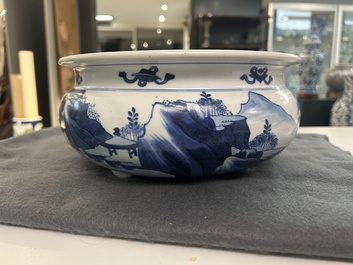 A Chinese blue and white tripod censer with figures in a mountainous landscape, Kangxi