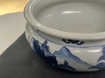 A Chinese blue and white tripod censer with figures in a mountainous landscape, Kangxi