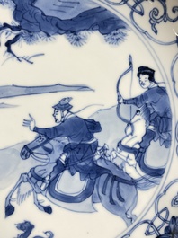 Three Chinese blue and white 'Mongolian hunt' plates, Chenghua mark, Kangxi