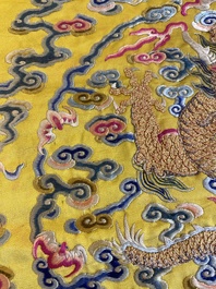 An imperial Chinese embroidered silk gold-thread yellow-ground cushion cover, 19th C.