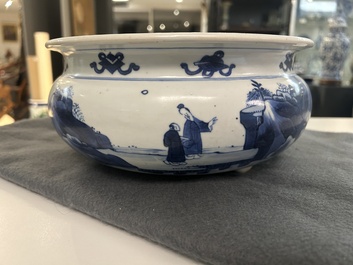 A Chinese blue and white tripod censer with figures in a mountainous landscape, Kangxi