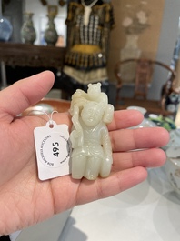 A Chinese white and russet jade sculpture of two boys, Qing