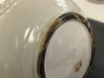 A Chinese white-glazed relief-molded bowl, Qianlong mark, 19th C.