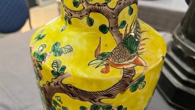 A pair of Chinese yellow-ground famille verte rouleau vases, 19th C.