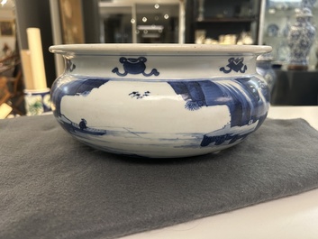 A Chinese blue and white tripod censer with figures in a mountainous landscape, Kangxi