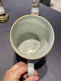 Une paire de vases en porcelaine de Chine famille rose aux montures en bronze dor&eacute; et une chope &agrave; sujet mandarin, Qianlong
