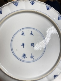 Three Chinese blue and white 'Mongolian hunt' plates, Chenghua mark, Kangxi