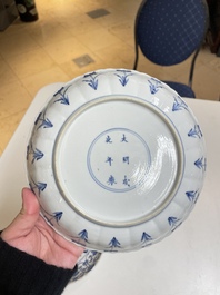 Three Chinese blue and white 'Mongolian hunt' plates, Chenghua mark, Kangxi