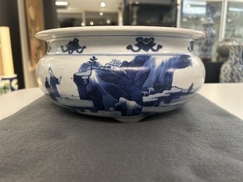 A Chinese blue and white tripod censer with figures in a mountainous landscape, Kangxi