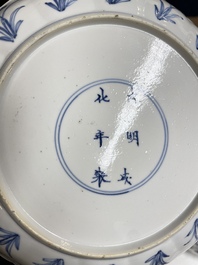Three Chinese blue and white 'Mongolian hunt' plates, Chenghua mark, Kangxi