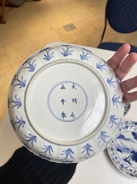 Three Chinese blue and white 'Mongolian hunt' plates, Chenghua mark, Kangxi