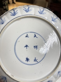 Three Chinese blue and white 'Mongolian hunt' plates, Chenghua mark, Kangxi