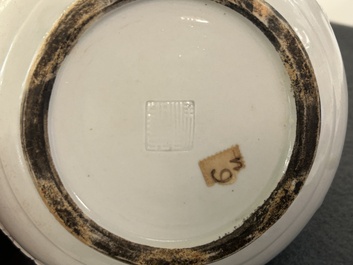 A Chinese white-glazed relief-molded bowl, Qianlong mark, 19th C.