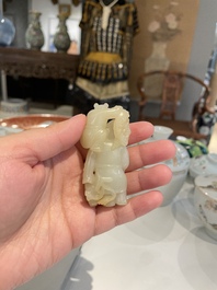 A Chinese white and russet jade sculpture of two boys, Qing