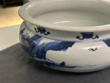 A Chinese blue and white tripod censer with figures in a mountainous landscape, Kangxi