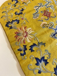 An imperial Chinese embroidered silk gold-thread yellow-ground cushion cover, 19th C.